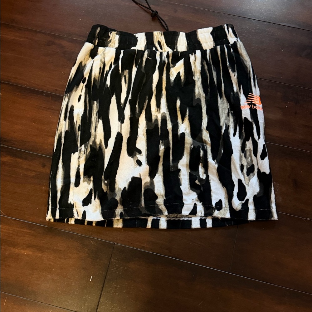 New Balance Black and White Mini Skirt with Orange Logo